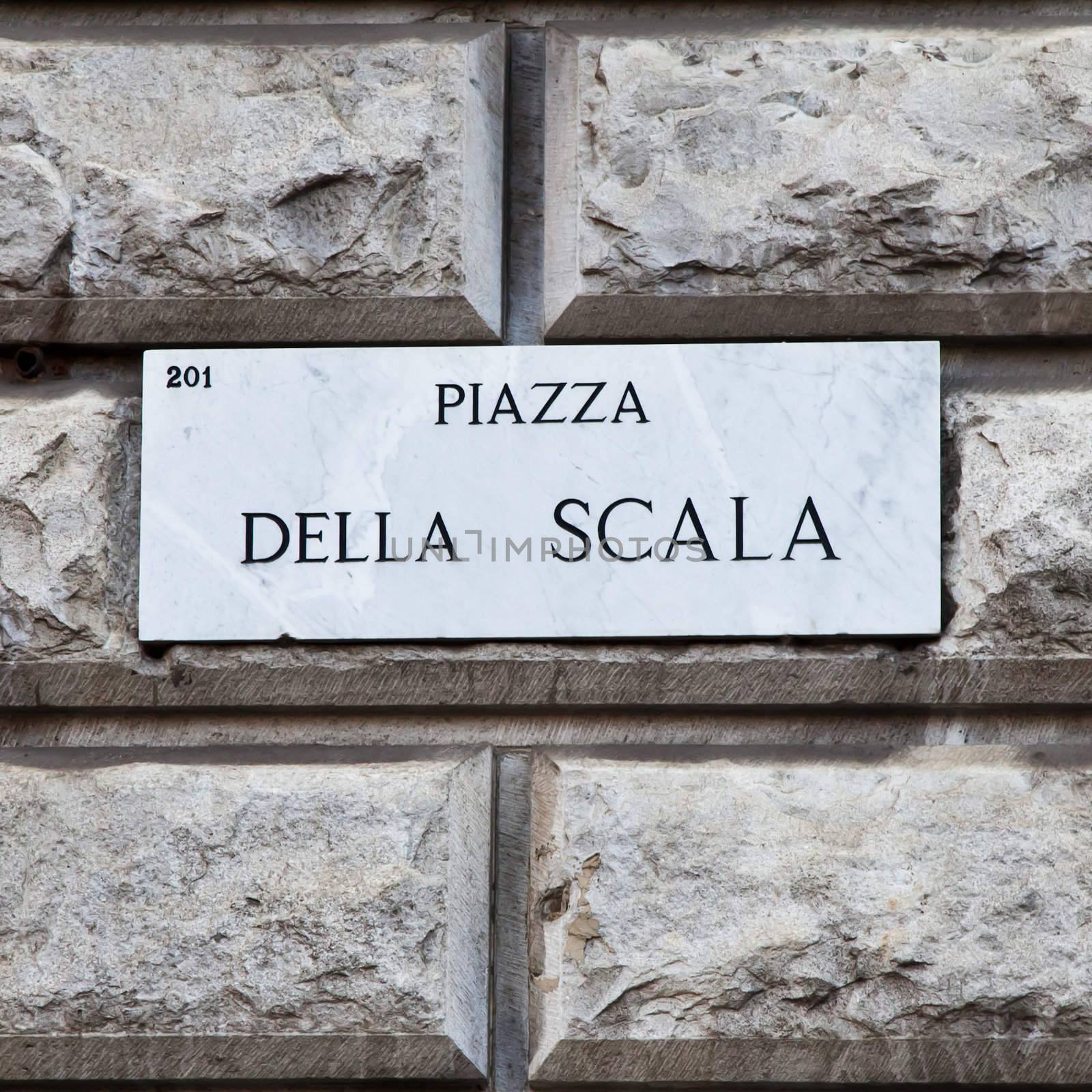 Street sign of famous interesting point in Milan center - Italy