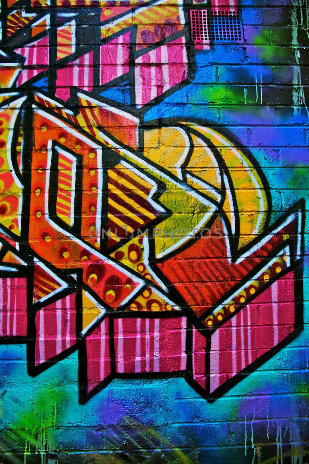 Graffiti design on a wall in the city