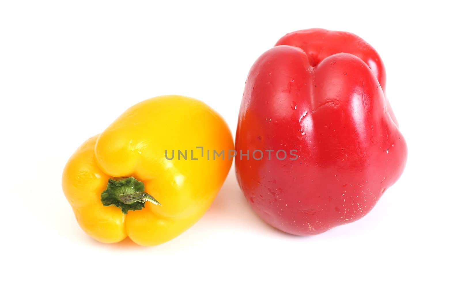 yellow and red pepper isolated on white