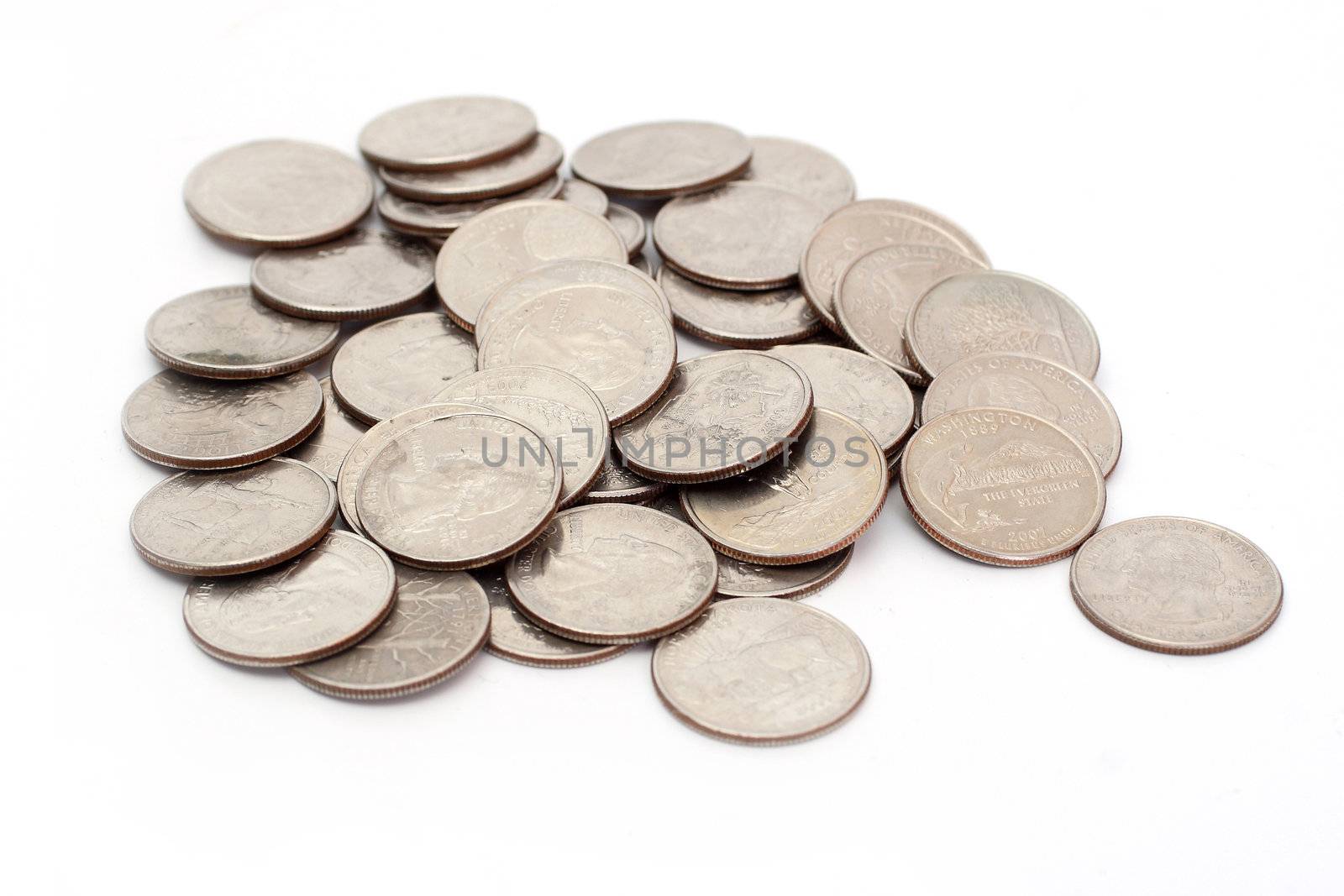 A pile of US Coins shot on a white background