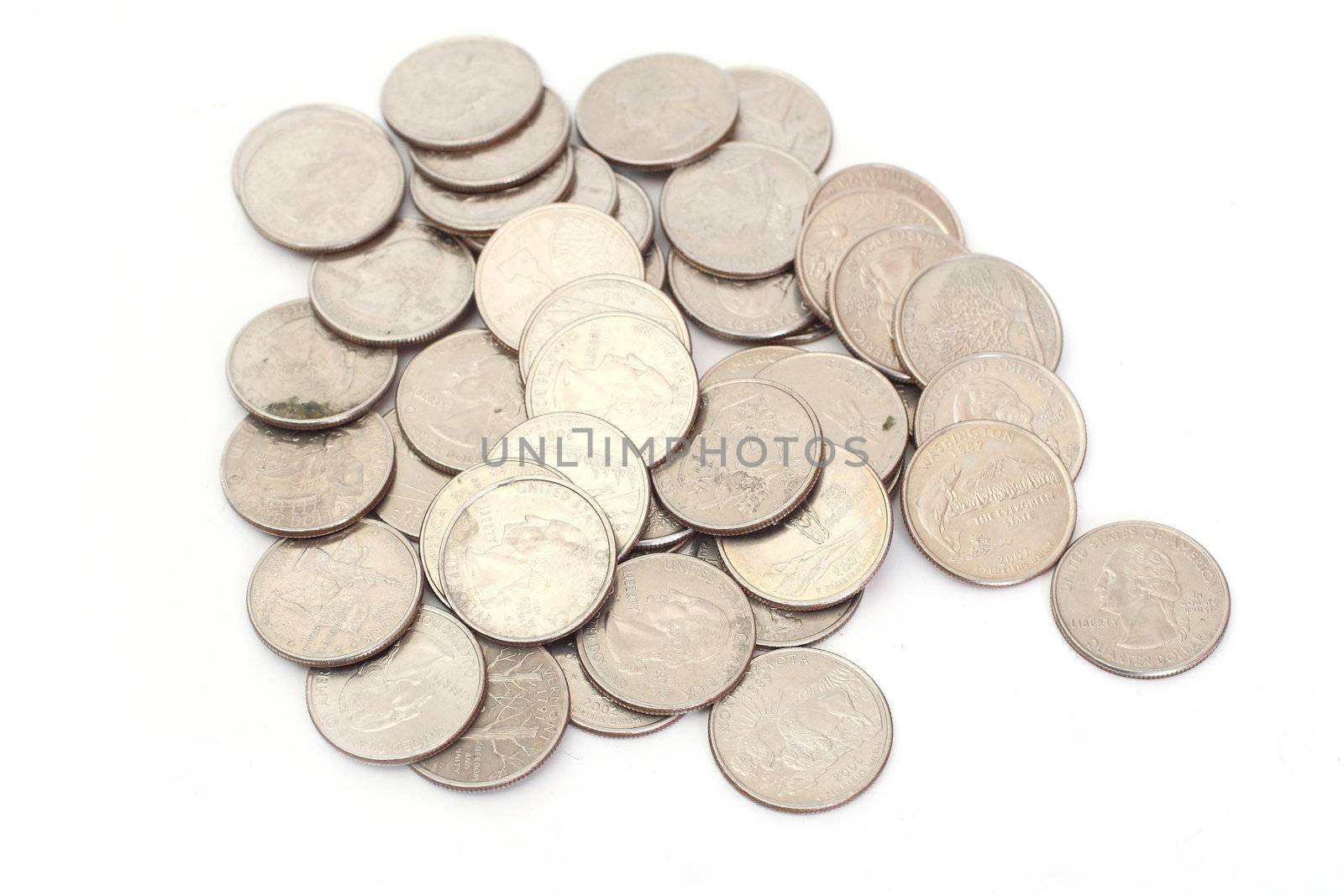 A pile of US Coins shot on a white background