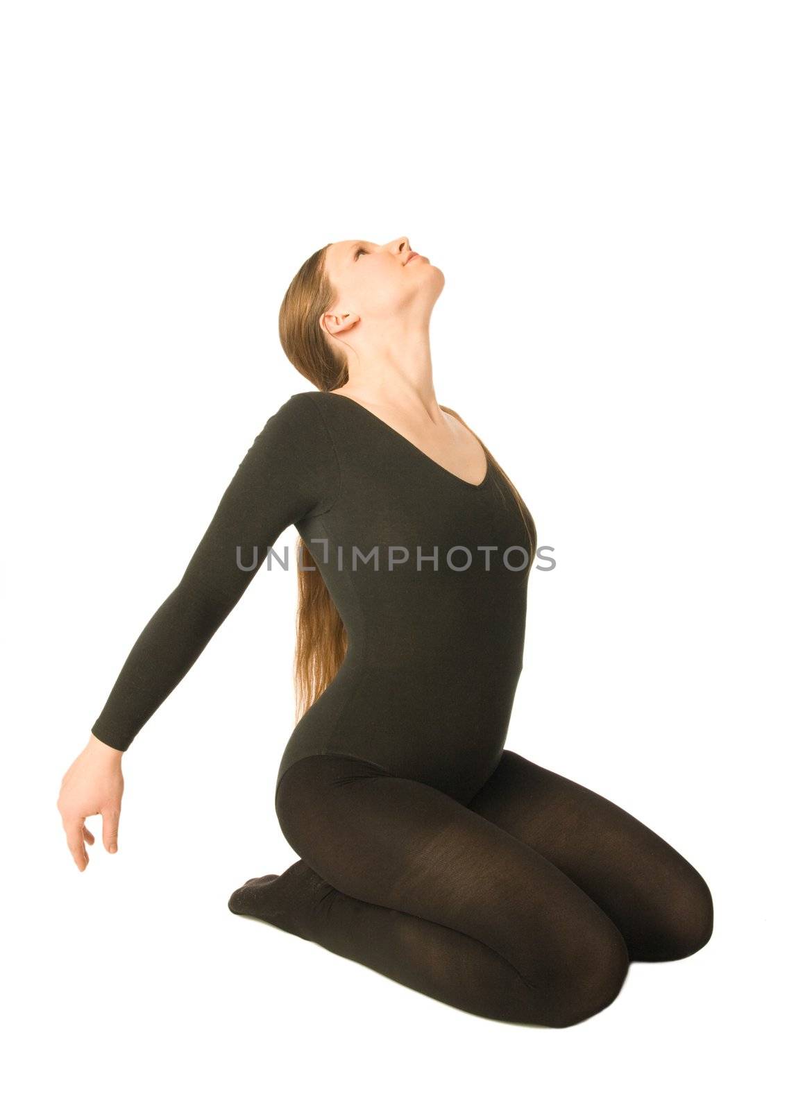 A young woman doing yoga exercices