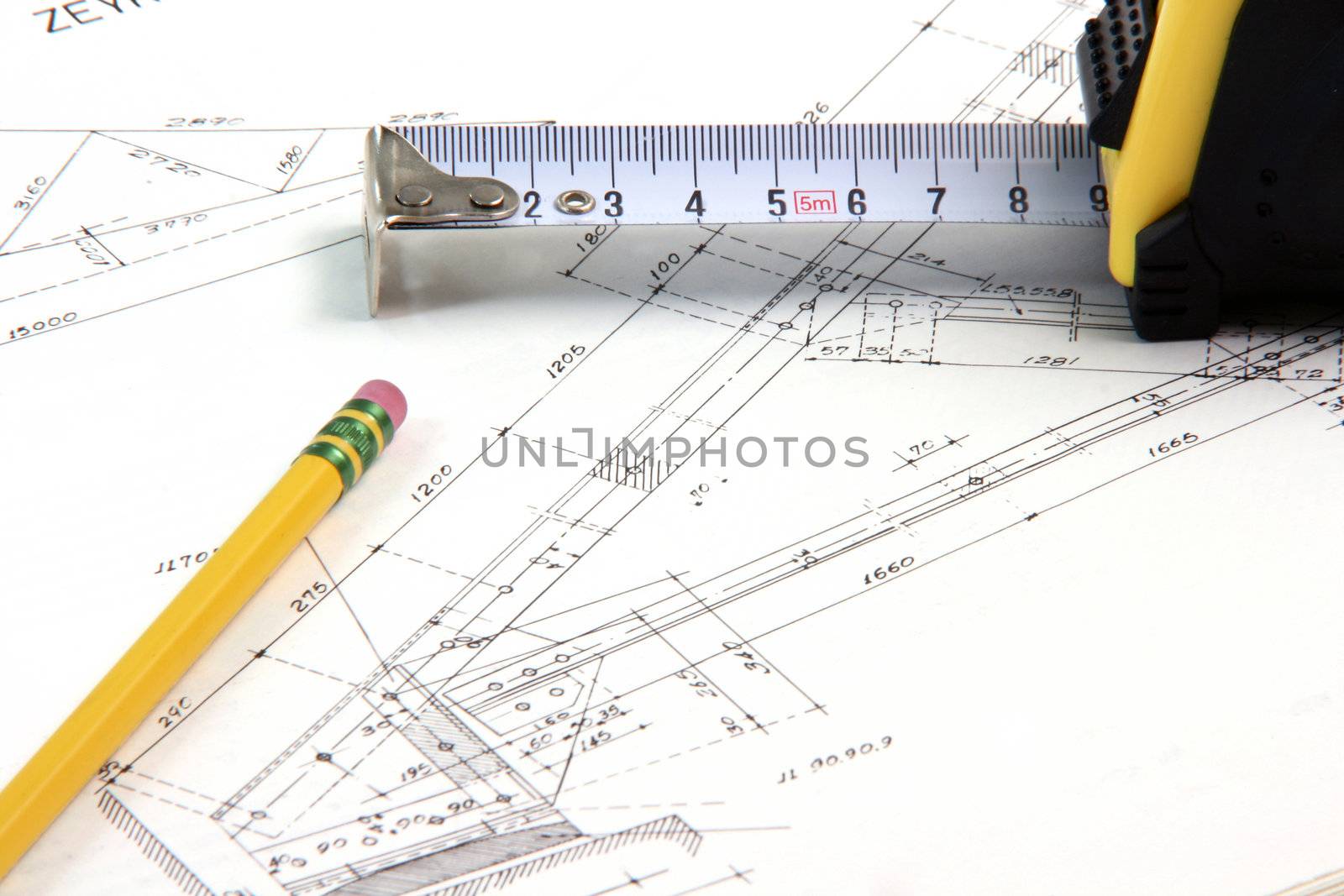 construction designs with pencil and meter tape architecture and building industry