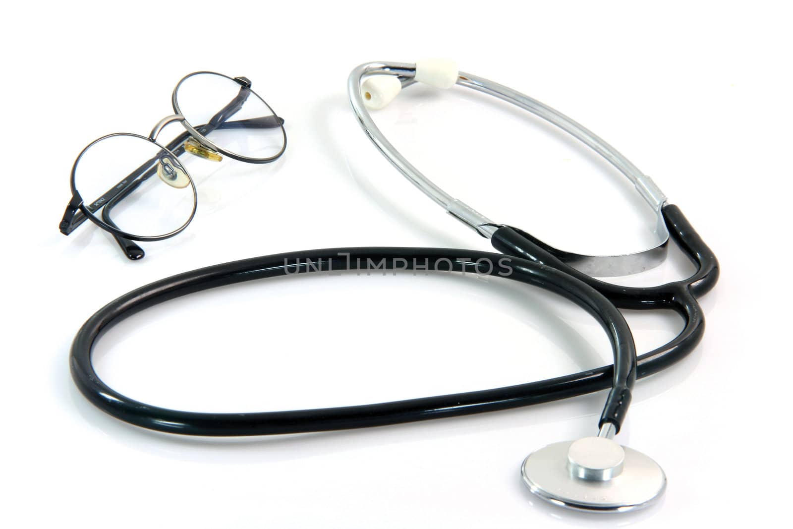 spectacles and auscultation phonendoscope health and medical objects isolated on white background