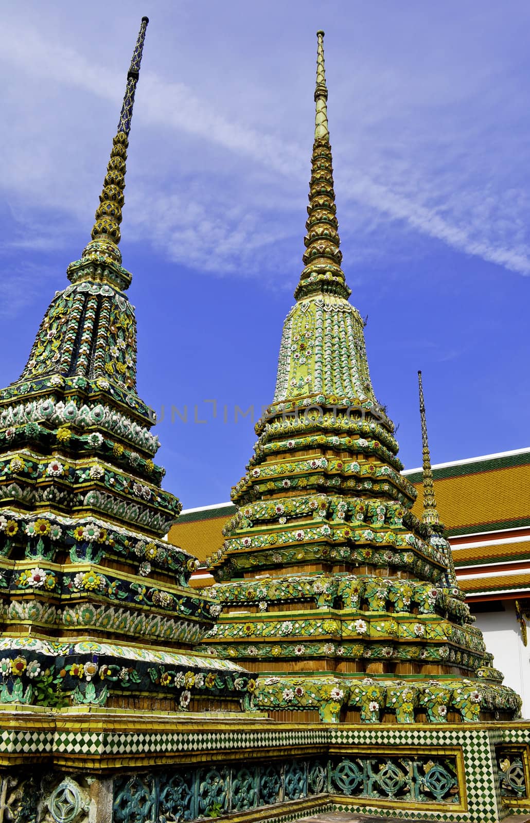 A mosiac colored wat in the center of Bangkok, Thailand on a sunny day