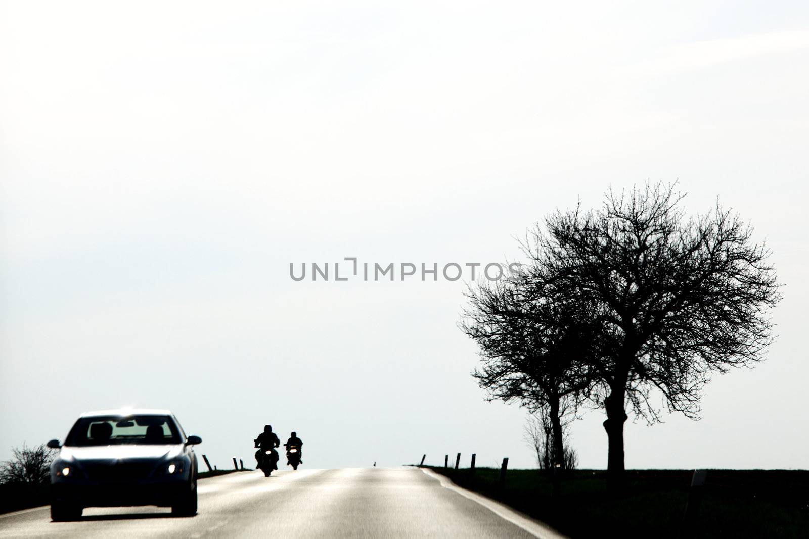 warm road car and bike silhouette