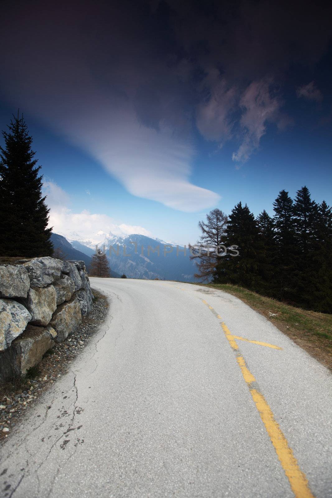 mountain road under blue sky