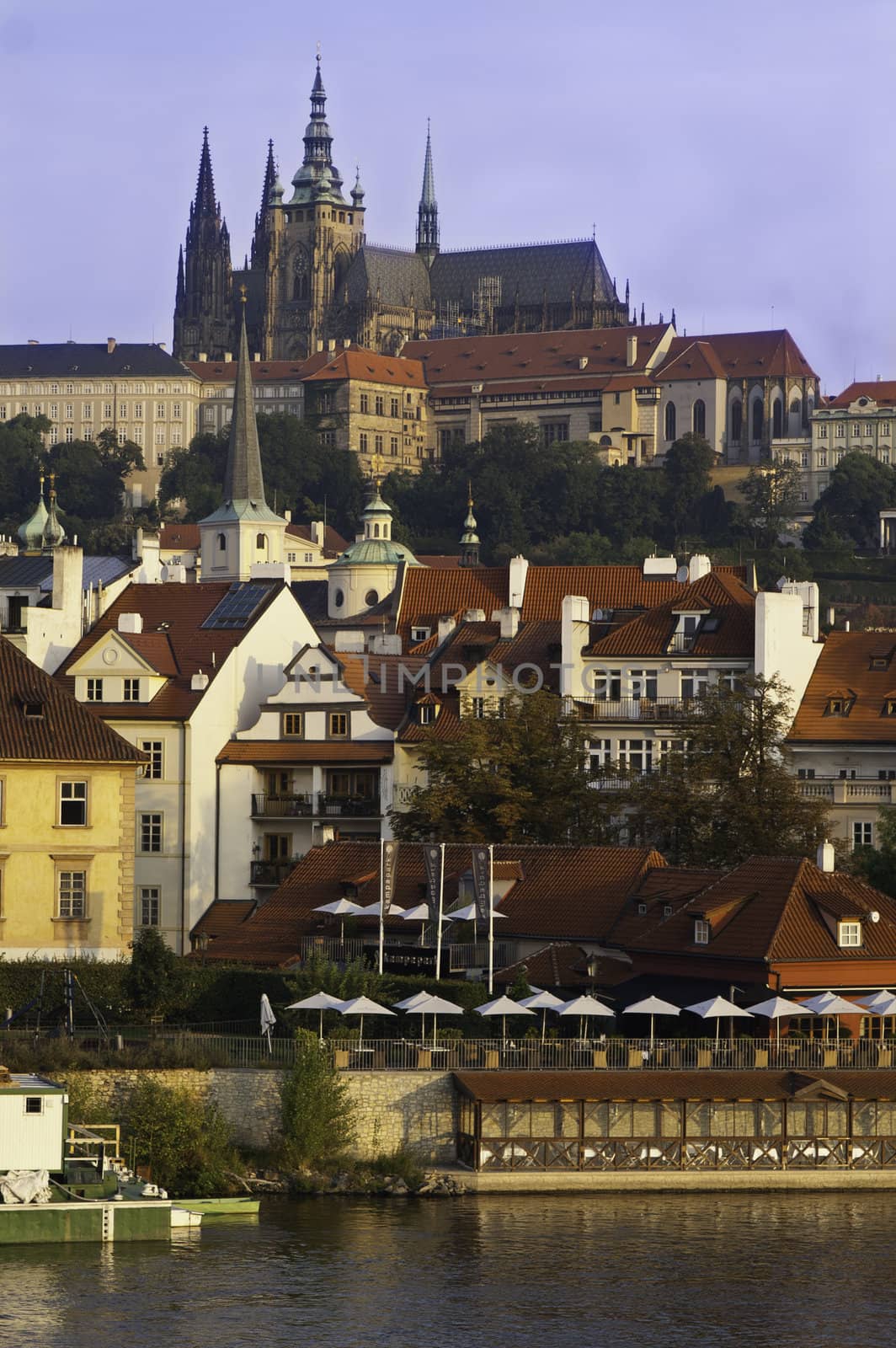 A distant view of the castle and prague from the famous bridge