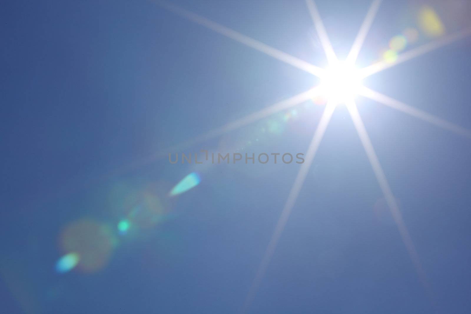 sun in blue day sky
