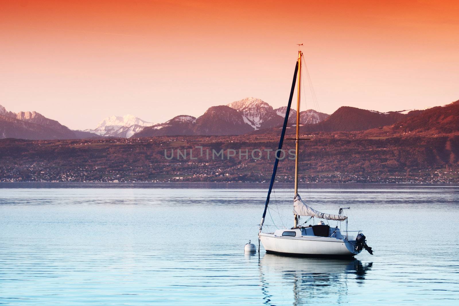 yacht in lake of geneva landscape on sunrise