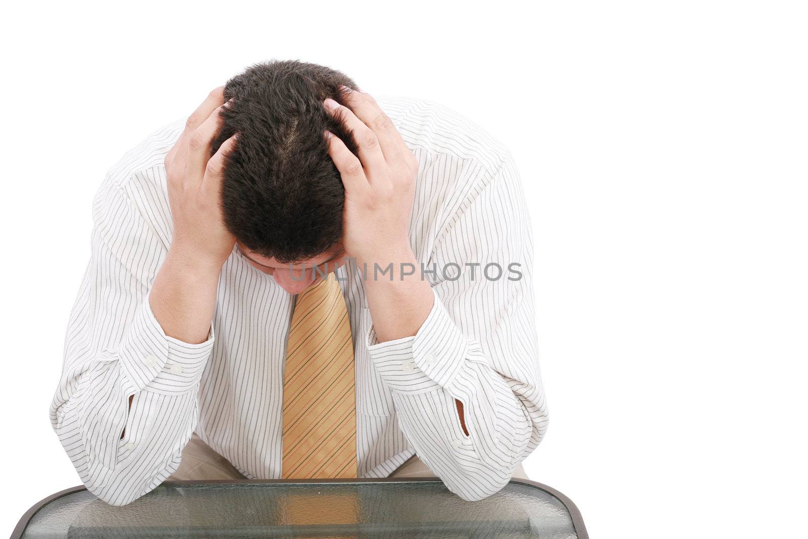 Close up of businessman holding hands up to face