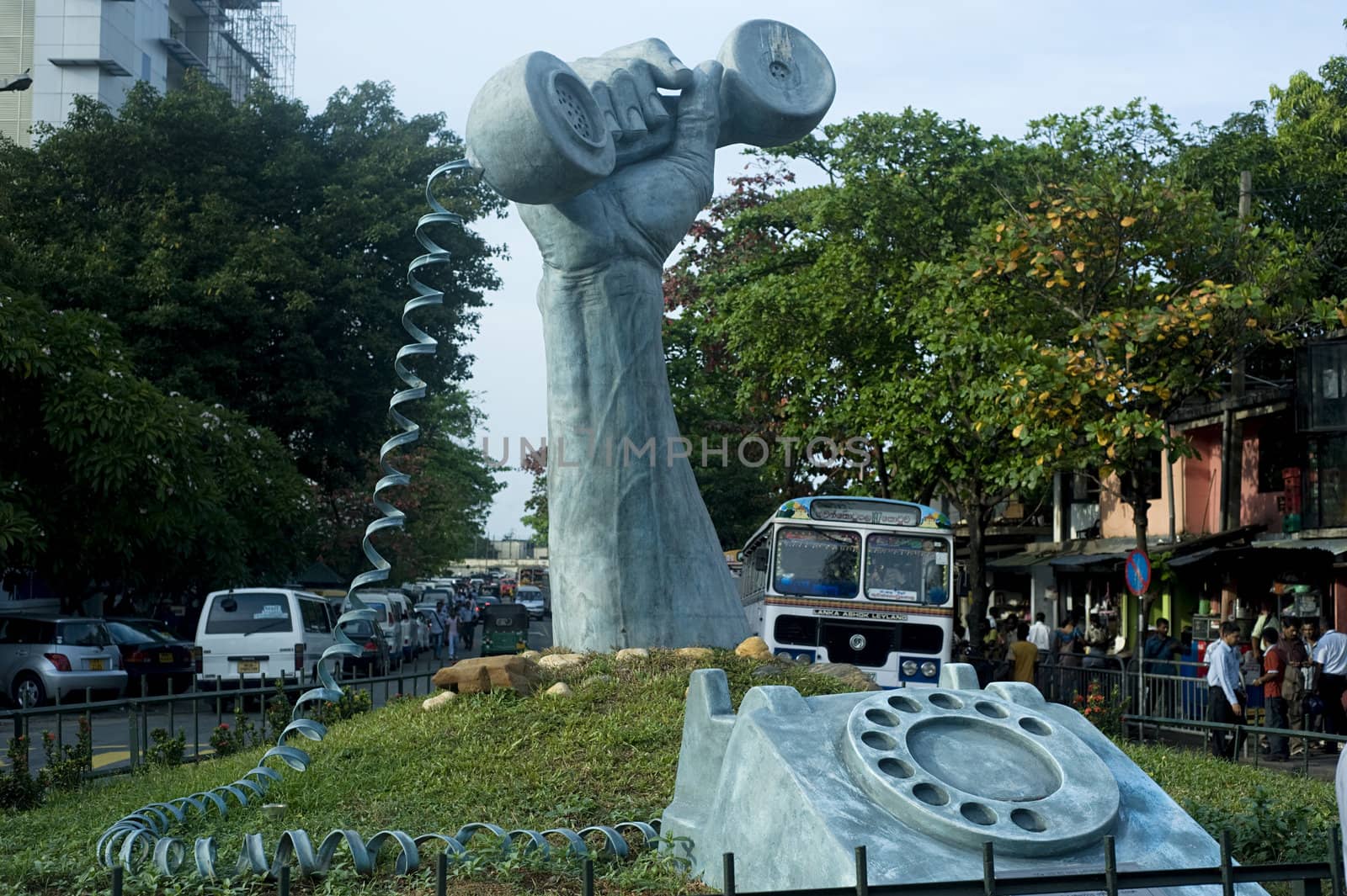  Colombo, Sri Lanka -  February 22,2011: Statue of a phone in a hand, Colombo, Sri Lanka
