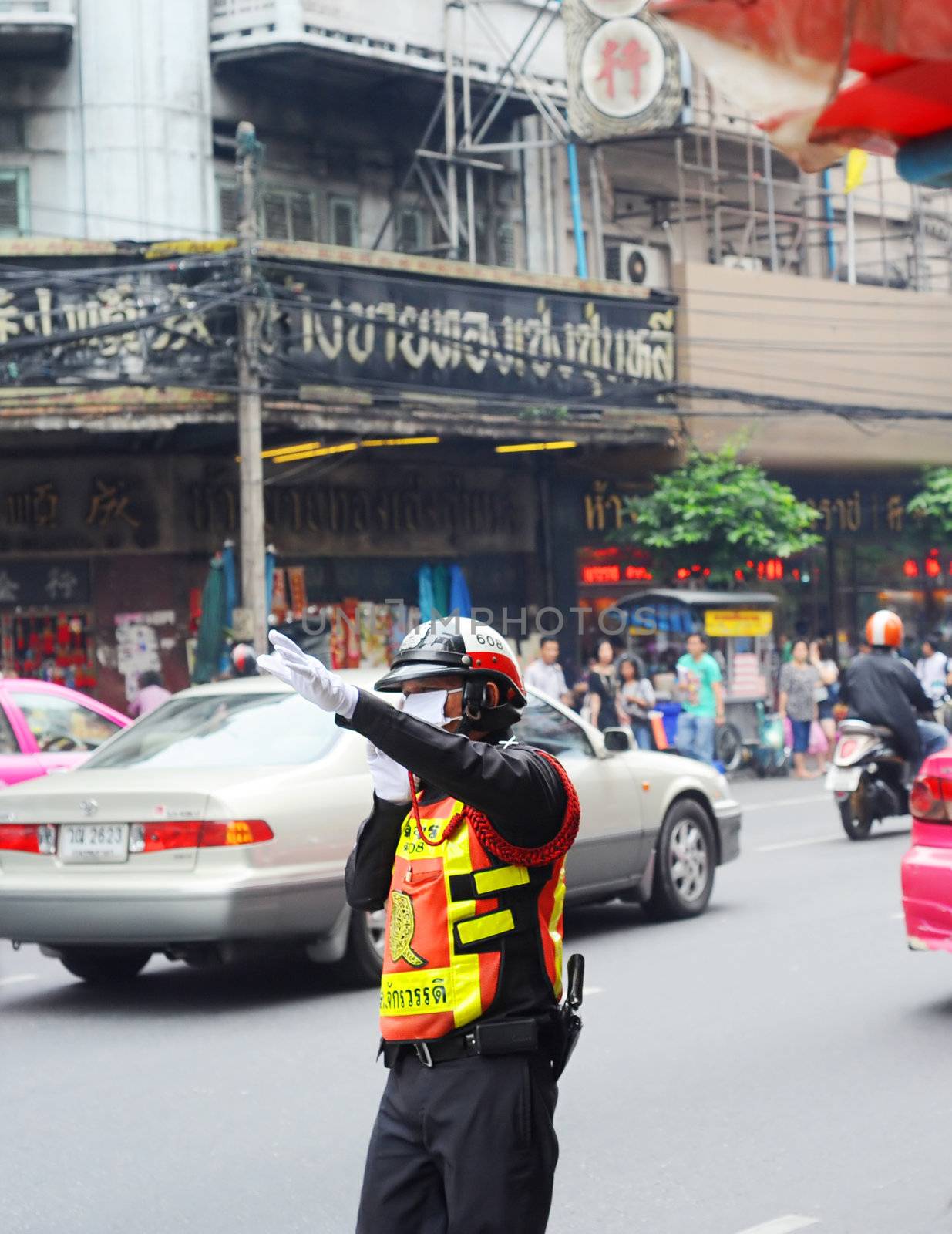 Bangkok, Thailand - March 26, 2011: Policeman on the Bangkok road. 