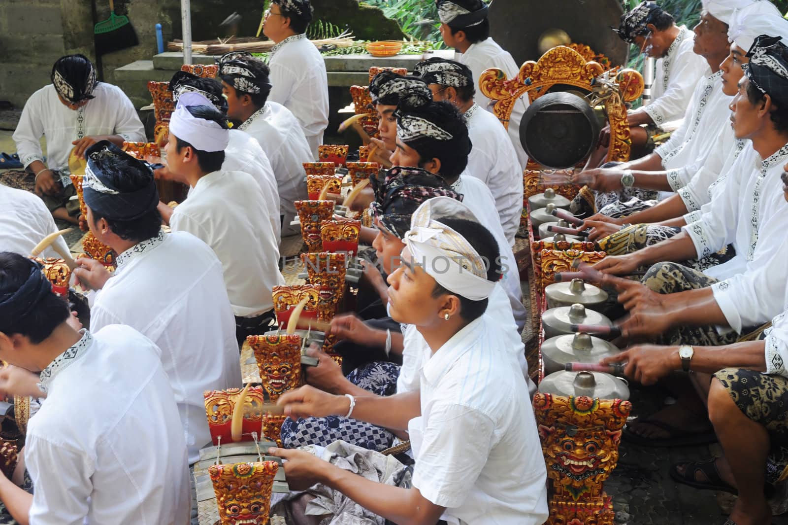 Ubud, Bali island, Indonesia - April, 06, 2011: Unidentified musicians wearing in traditional indonesian clothes take part in Buda Wage Kelawu ceremony at Hindu temple.