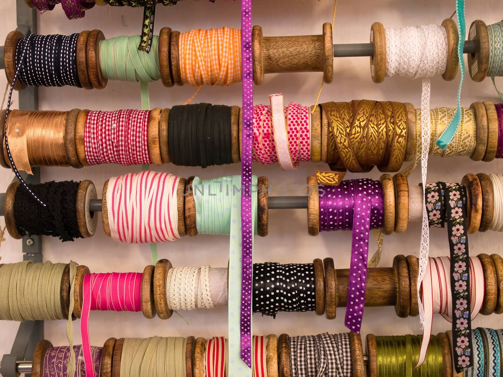 Variety selection of decorative colorful ribbons in hand craft shop
