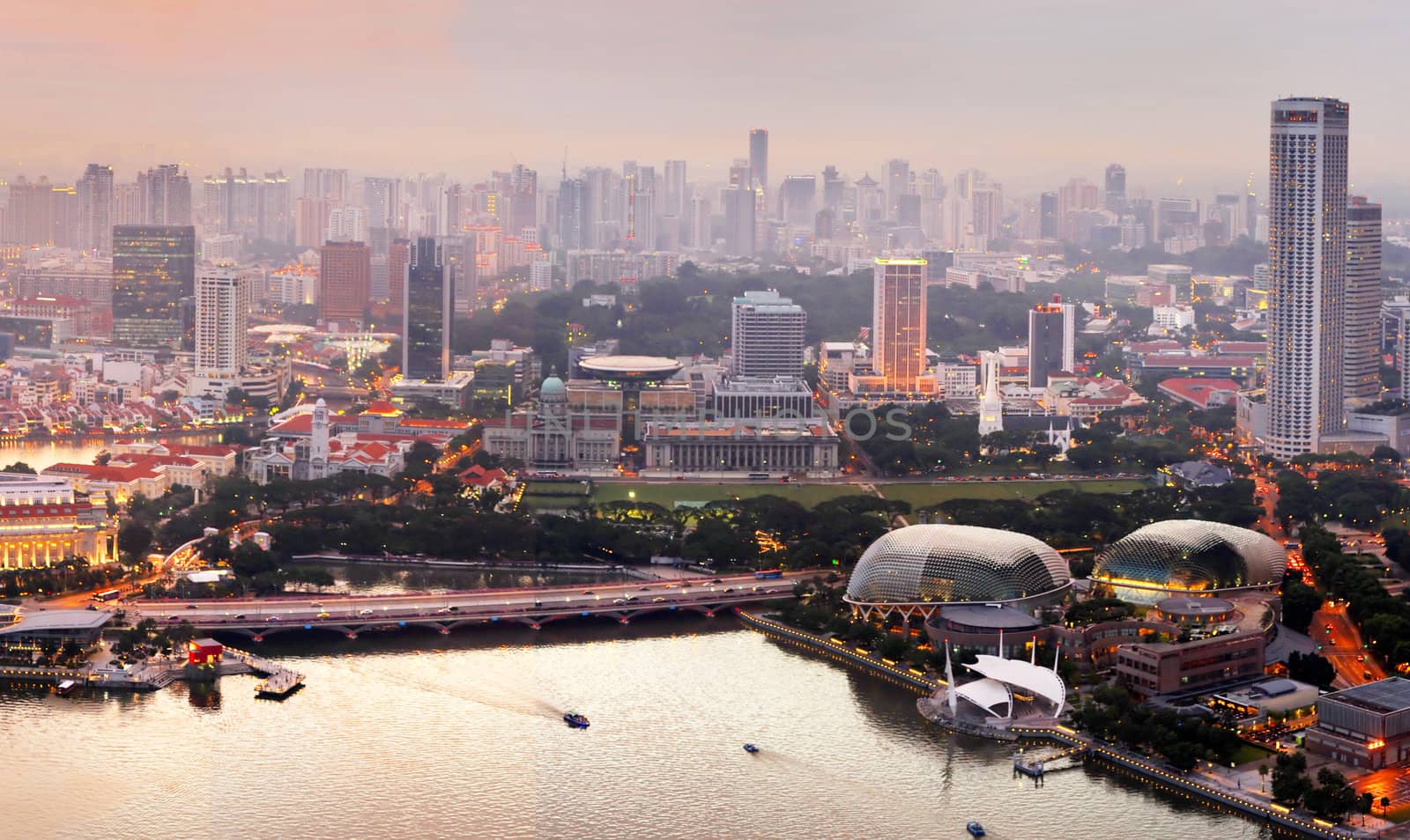 Panorama of Singapore from Marina Bay Sand Resort at beautiful sunset