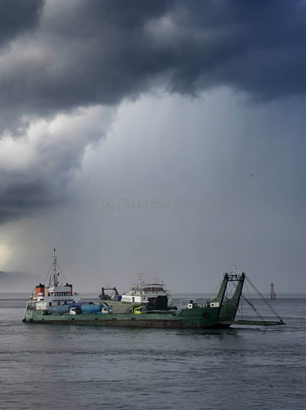 Ferry from Java to Bali under the storm. Indonesia