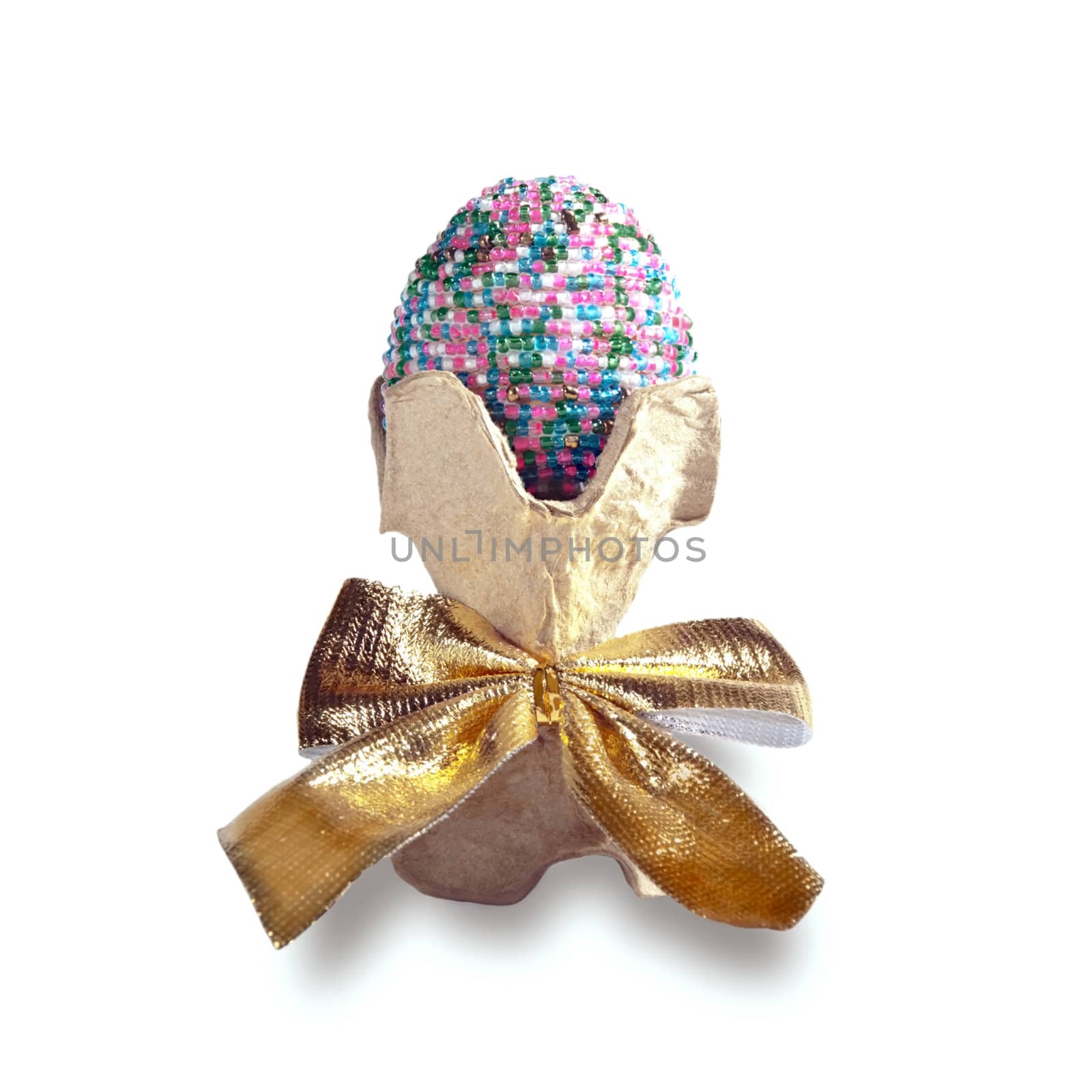 Decorative Easter eggs decorated with a golden bow.