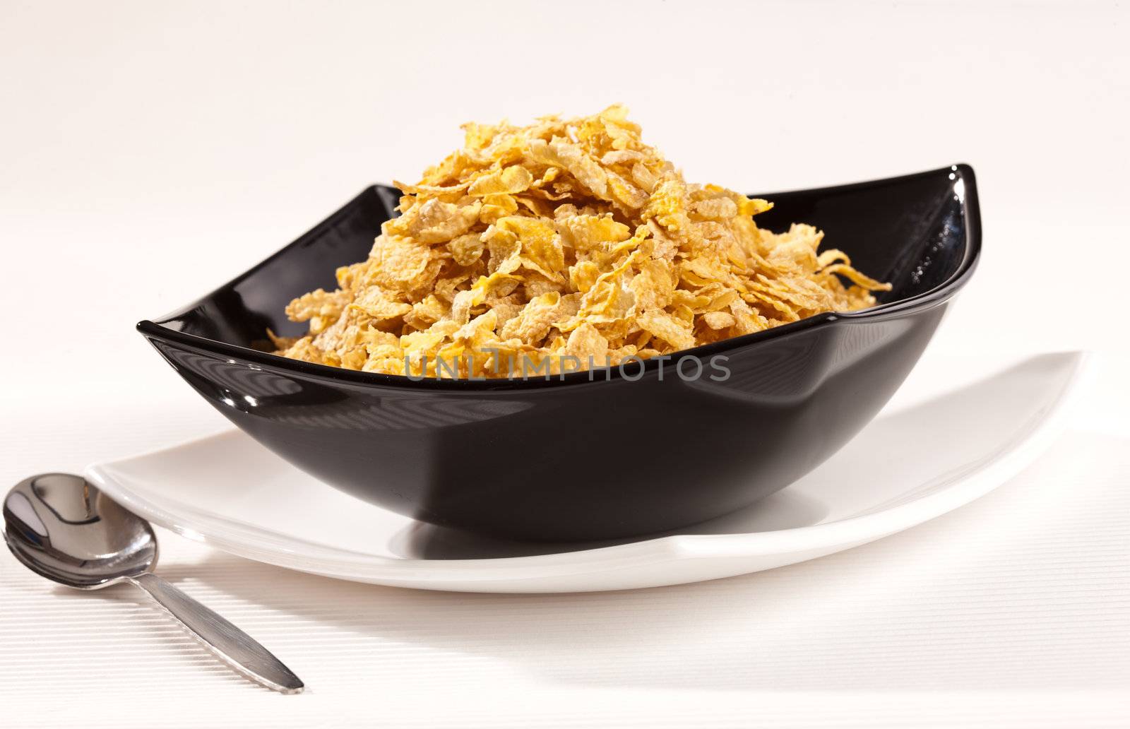 food series: tasty corn flakes in the black bowl