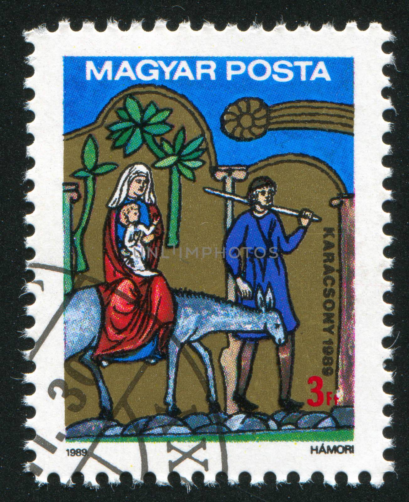 HUNGARY - CIRCA 1989: stamp printed by Hungary, shows Mother of God on the Ass with the Child Jesus  and Joseph, circa 1989