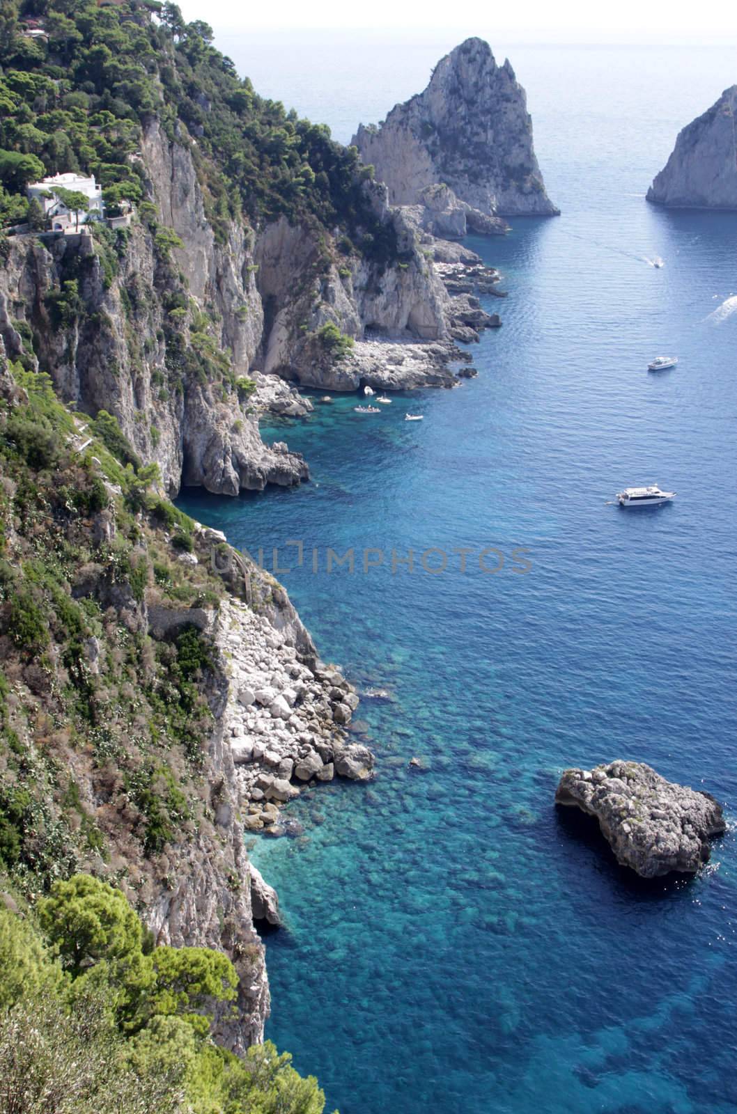 The coastline of the island of Capri, which is off Sorrentine peninsula in the Bay of Naples, Italy.
