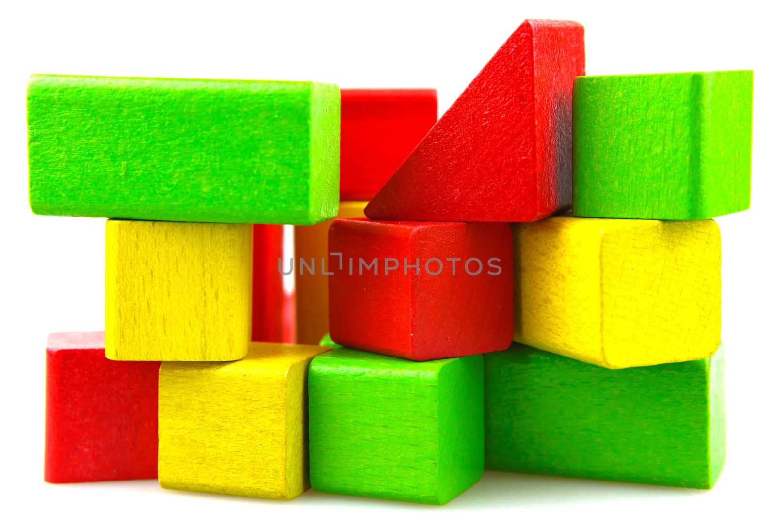 Wooden building blocks isolated on white background