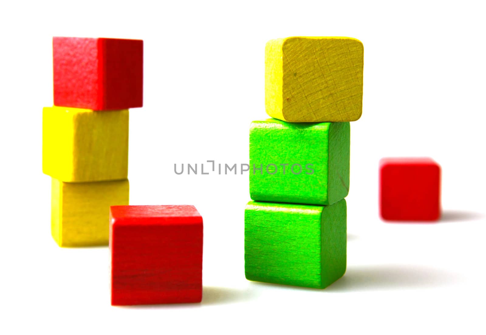 Wooden building blocks isolated on white background