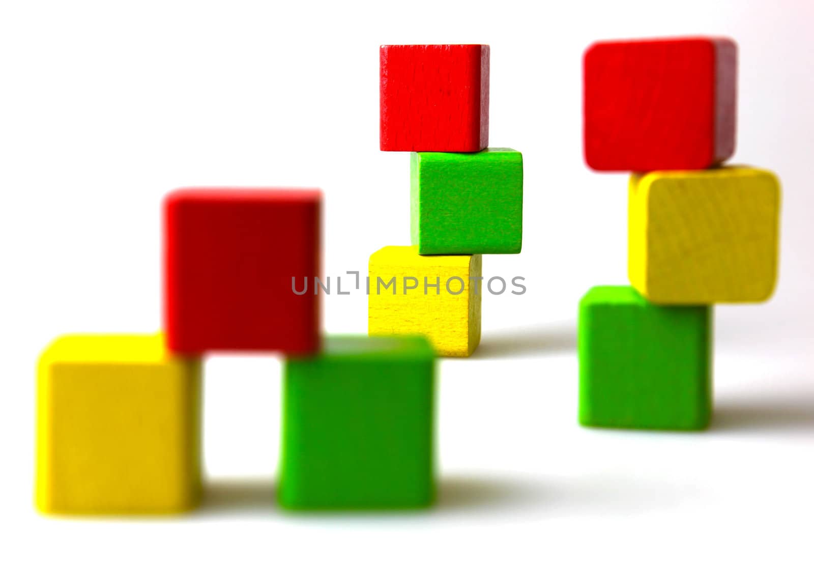 Wooden building blocks isolated on white background
