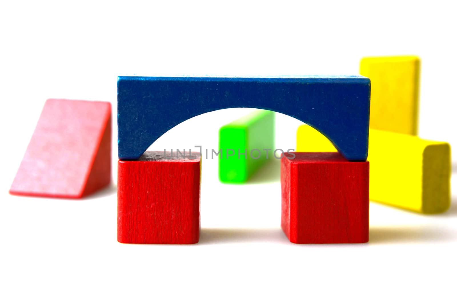 Wooden building blocks isolated on white background
