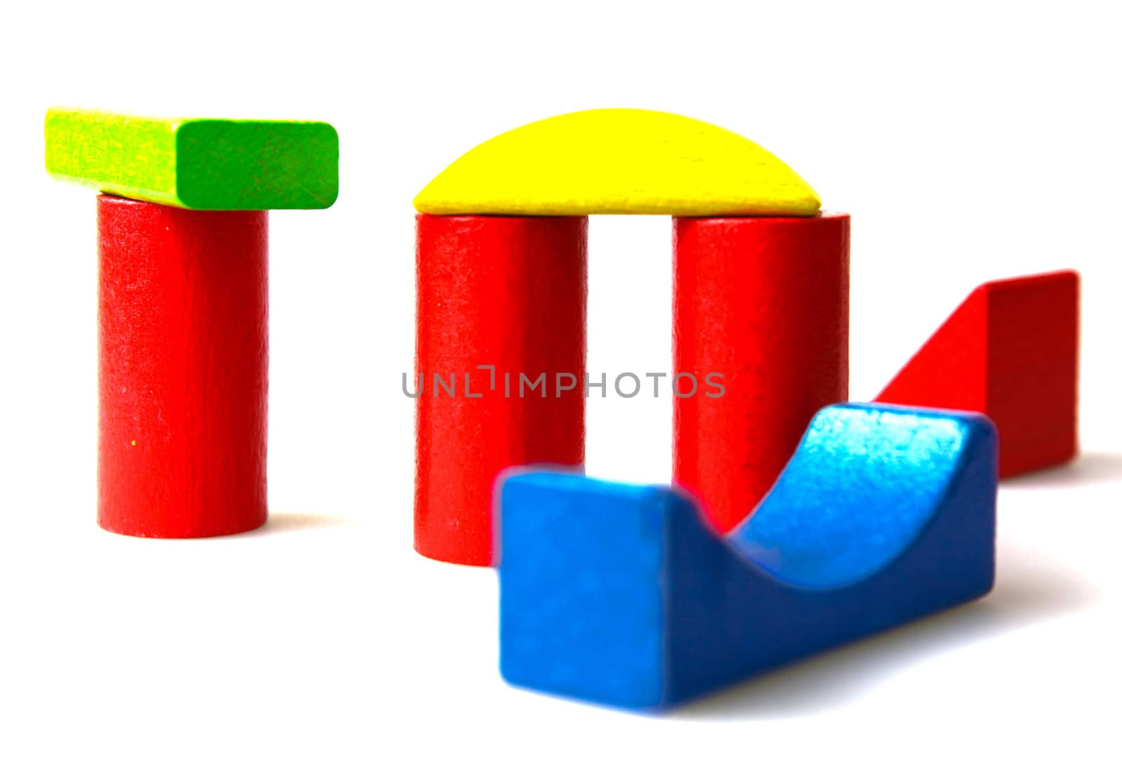 Wooden building blocks isolated on white background