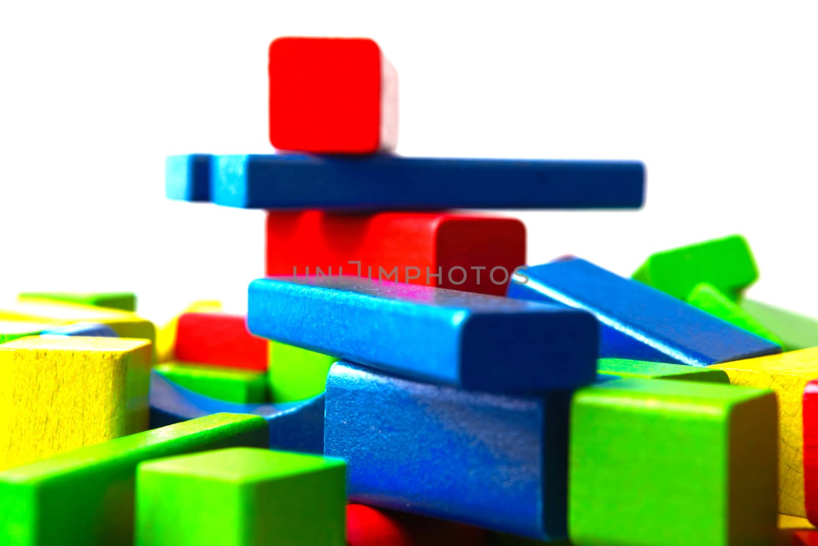 Wooden building blocks isolated on white background