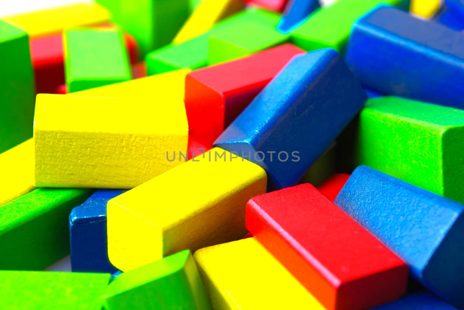 Wooden building blocks isolated on white background