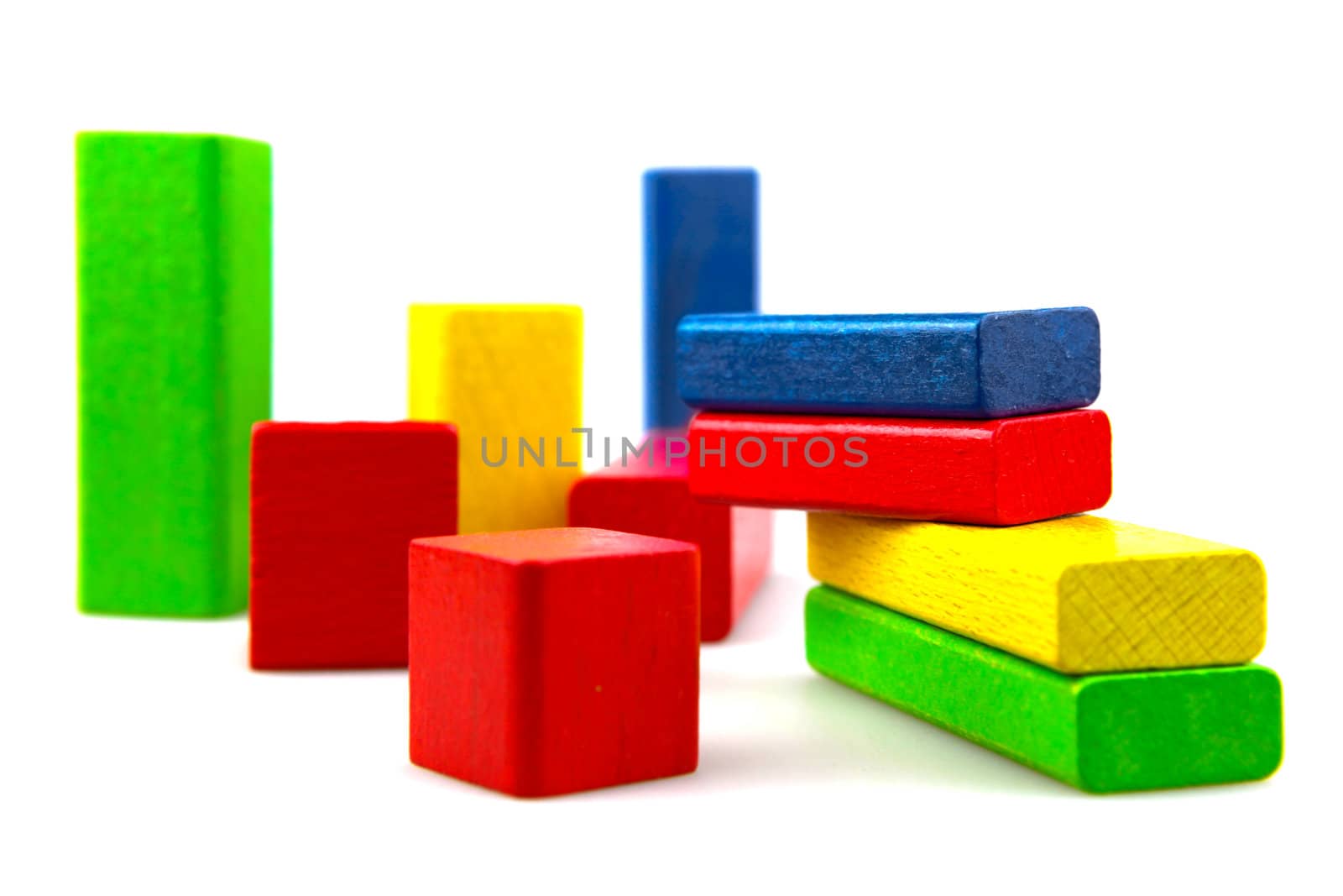 Wooden building blocks isolated on white background
