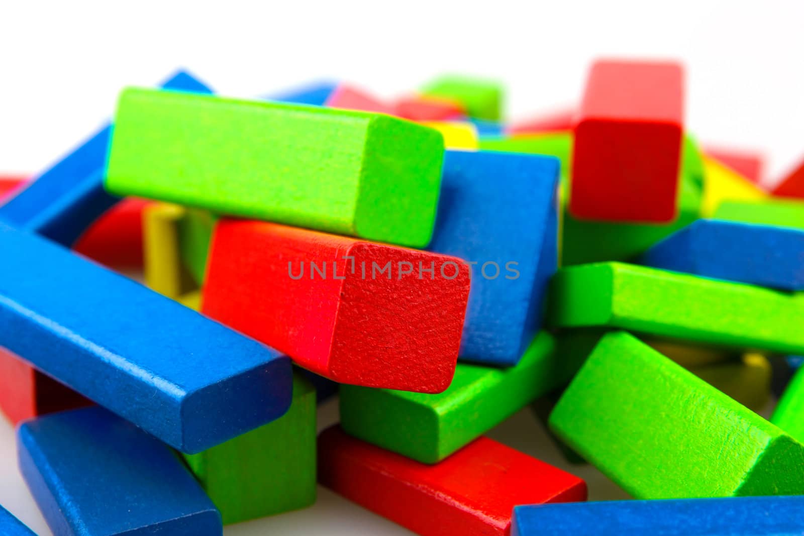 Wooden building blocks isolated on white background