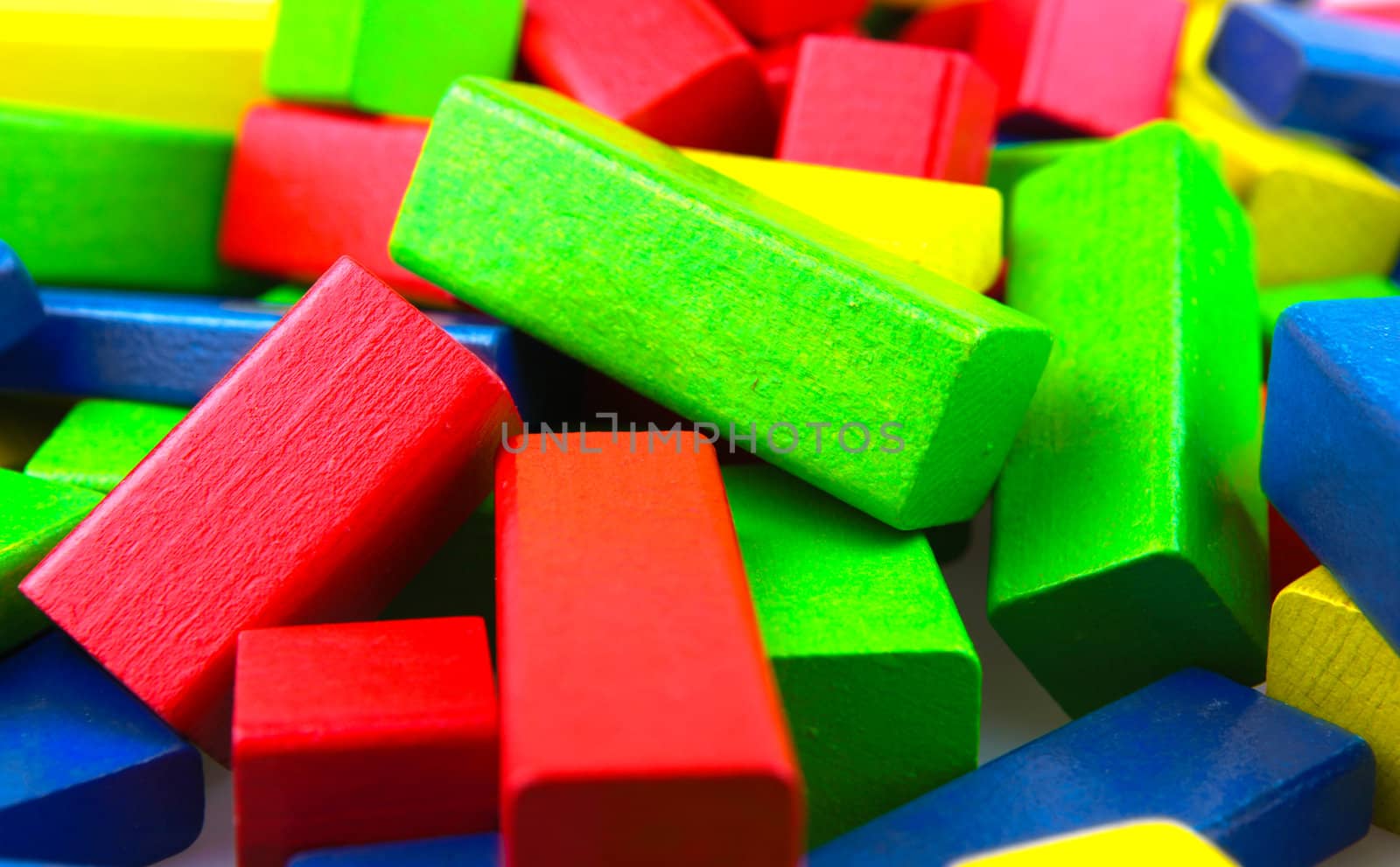 Wooden building blocks isolated on white background