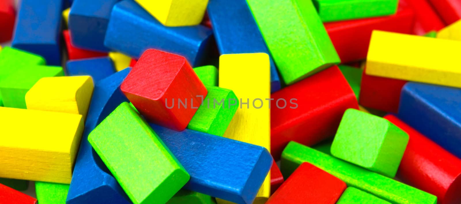 Wooden building blocks isolated on white background