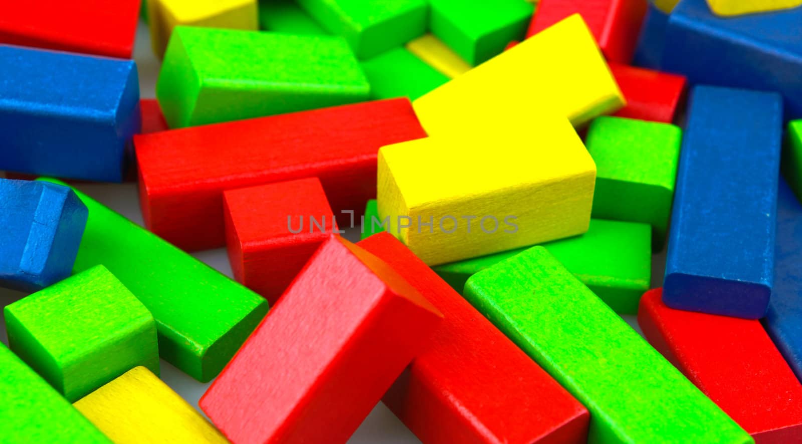 Wooden building blocks isolated on white background