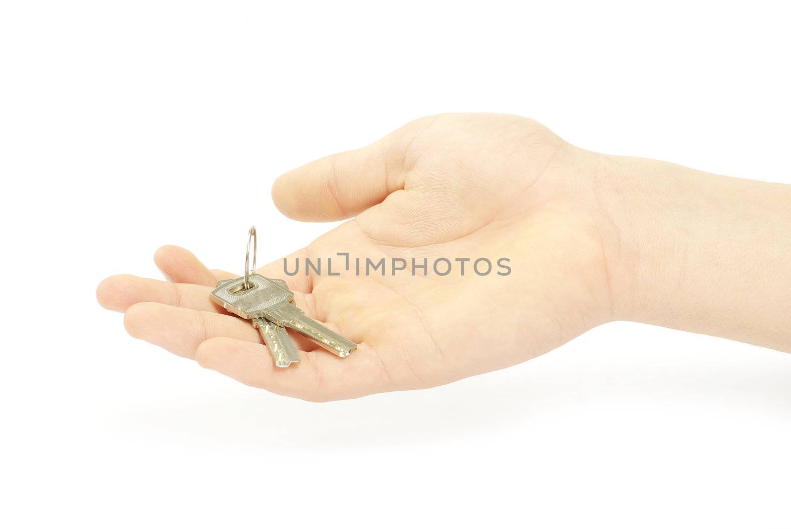 hand holds a key isolated on white
