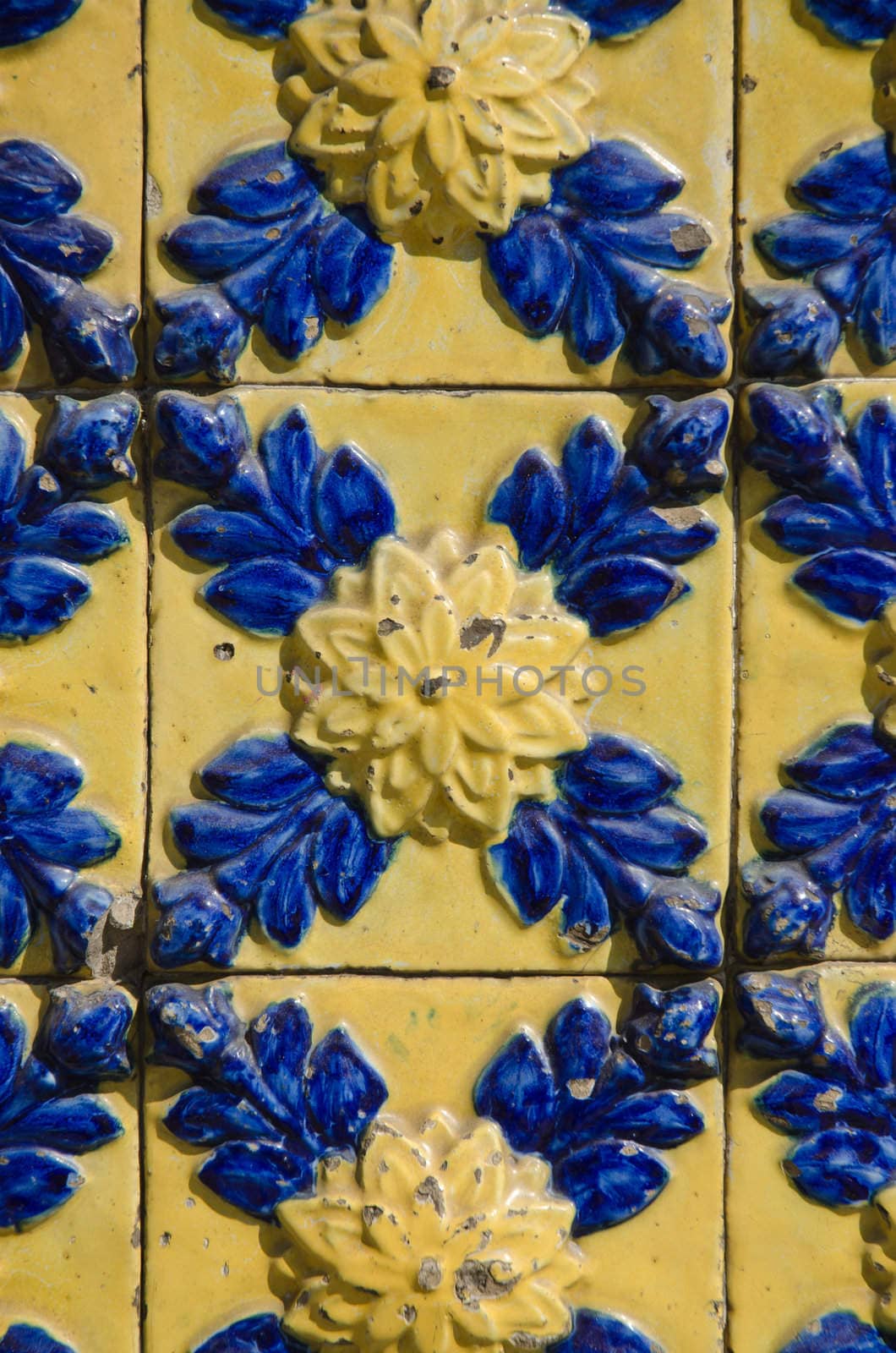 Portuguese azulejos, old tiled blue background.