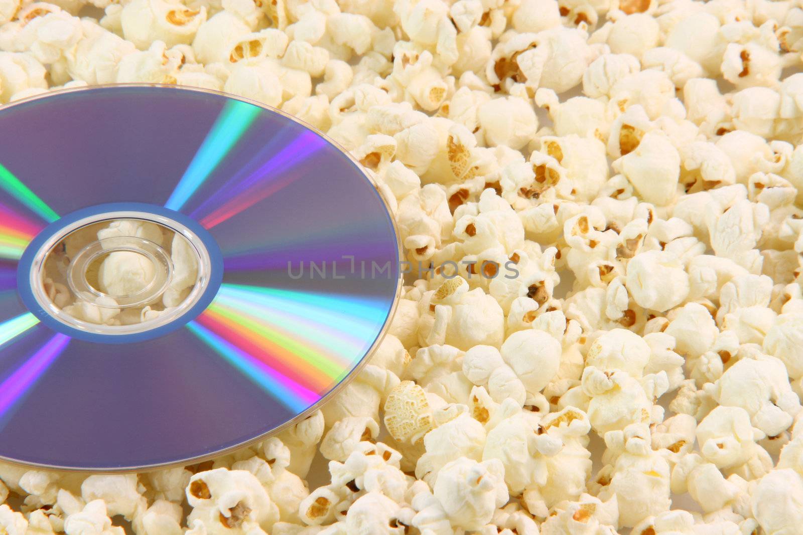 dvd disc movie on pop corn background food  entertainment dvd store conceps