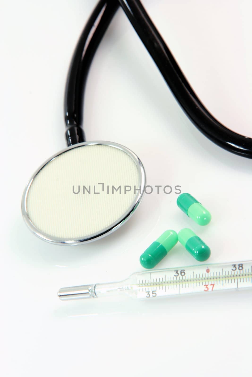 thermometer capsules and phonendoscope health and medical objects isolated on white background