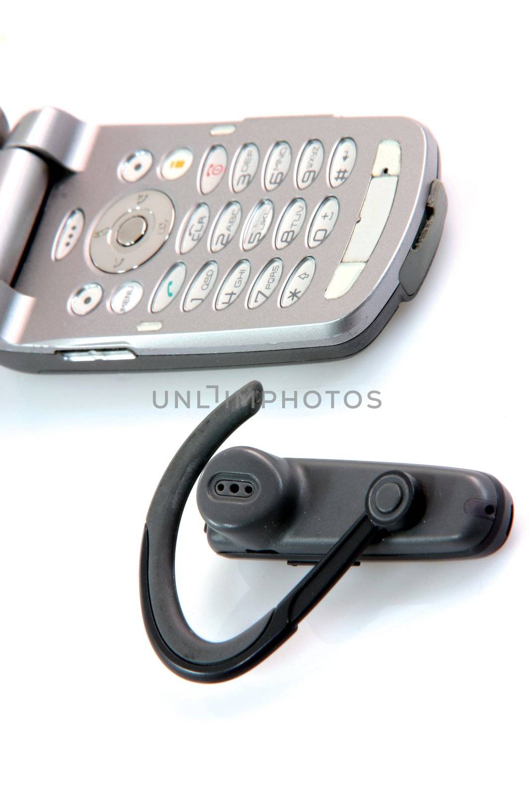 cell phone detail with hands free communication concepts isolated