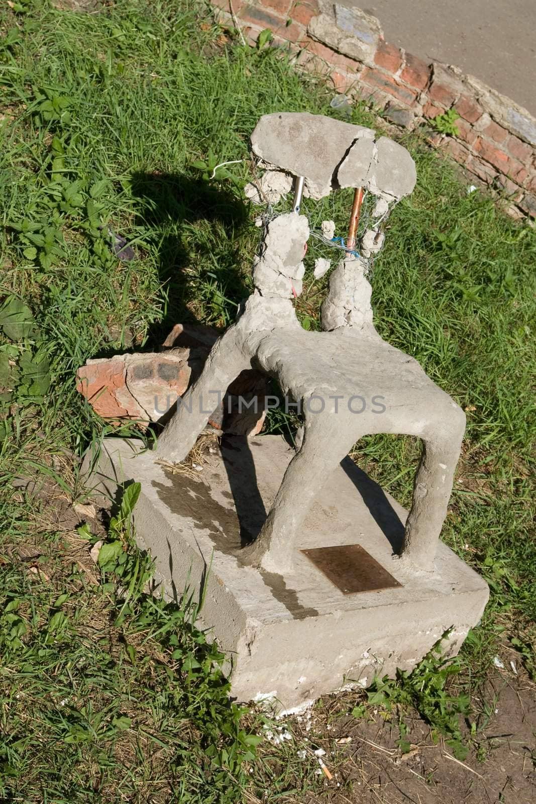 old destroyed plaster chair - a part of a sculpture