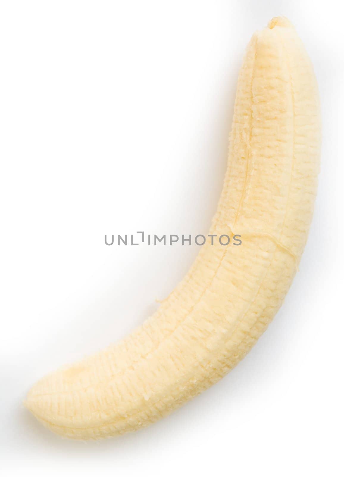 one ripe banana on a white background