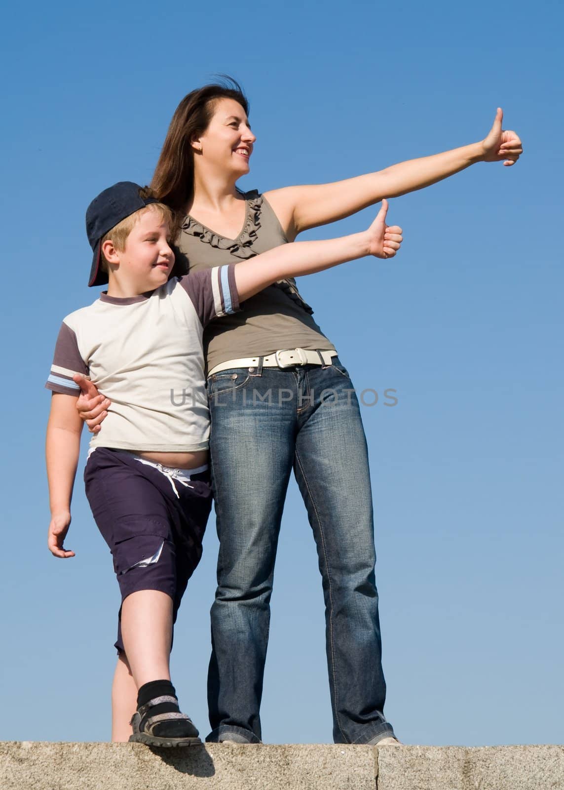 Family with thumb up on a sky background