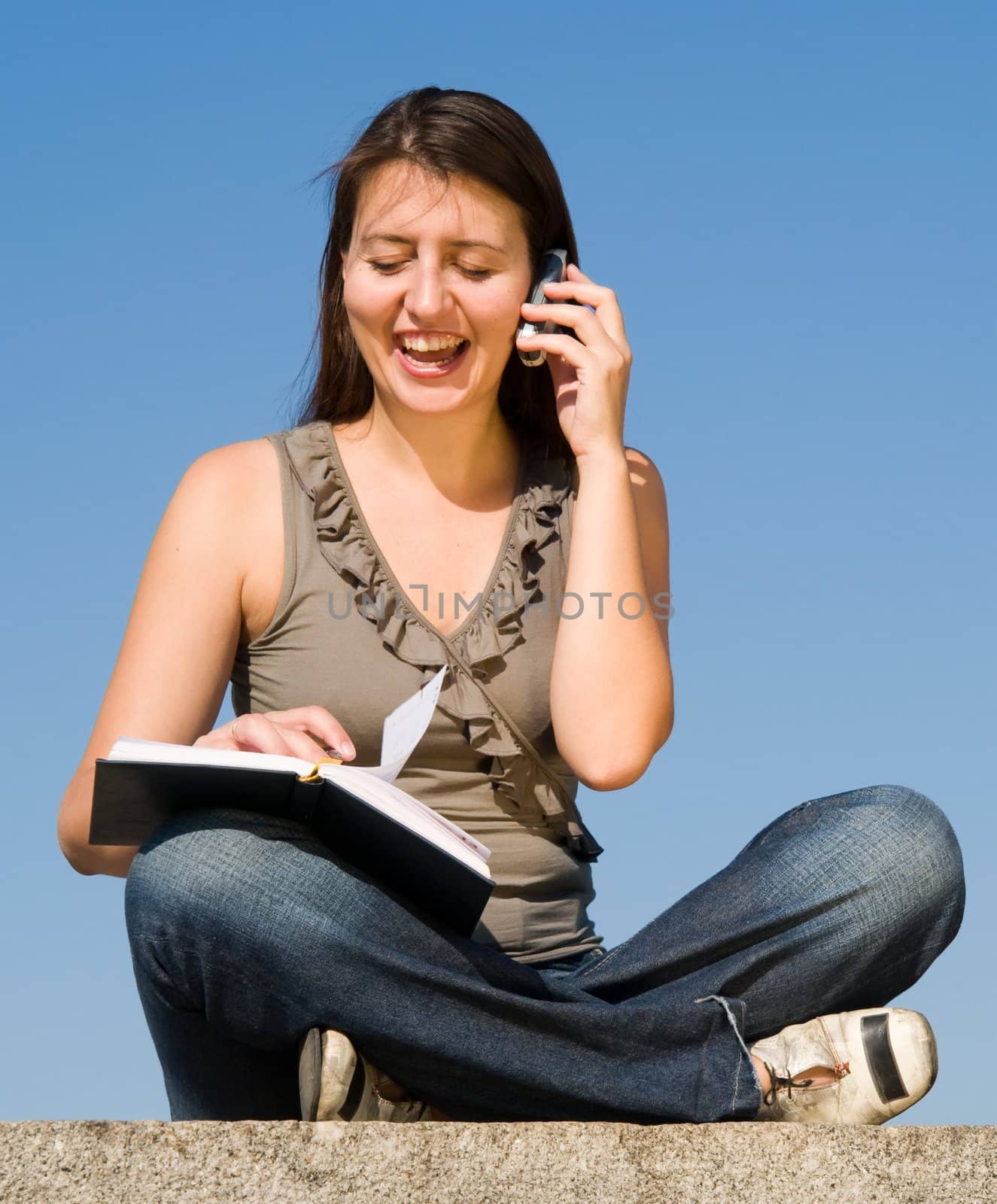 girl writes to writing-books and speaks by phone