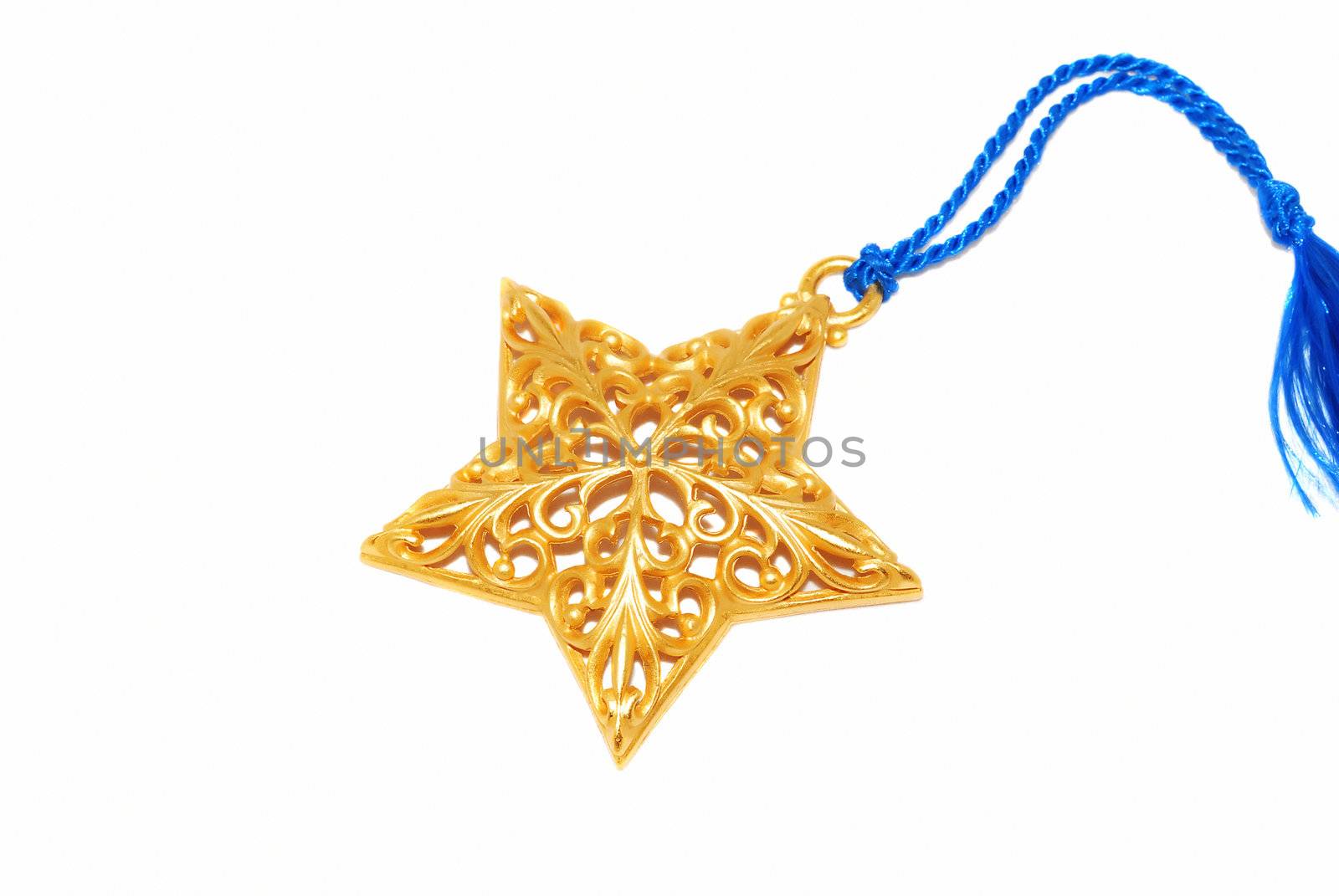 Gold Christmas star ornament with silk ribbon isolated on the white. 