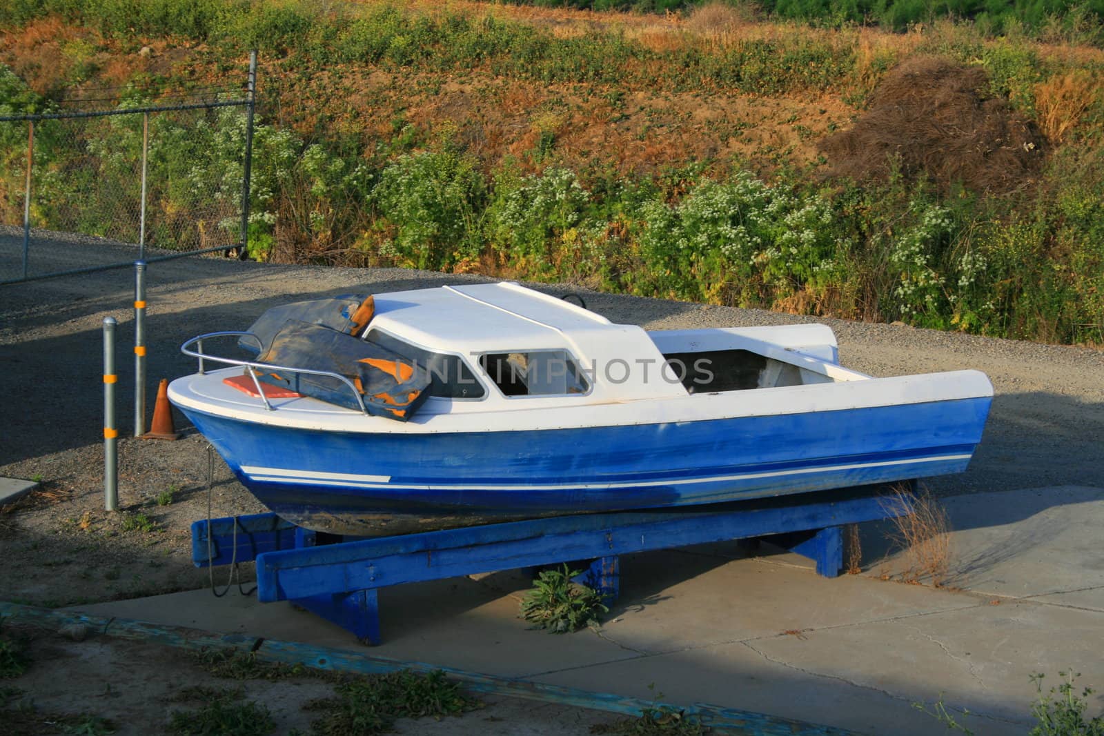 Old boat at a boat storage place.
