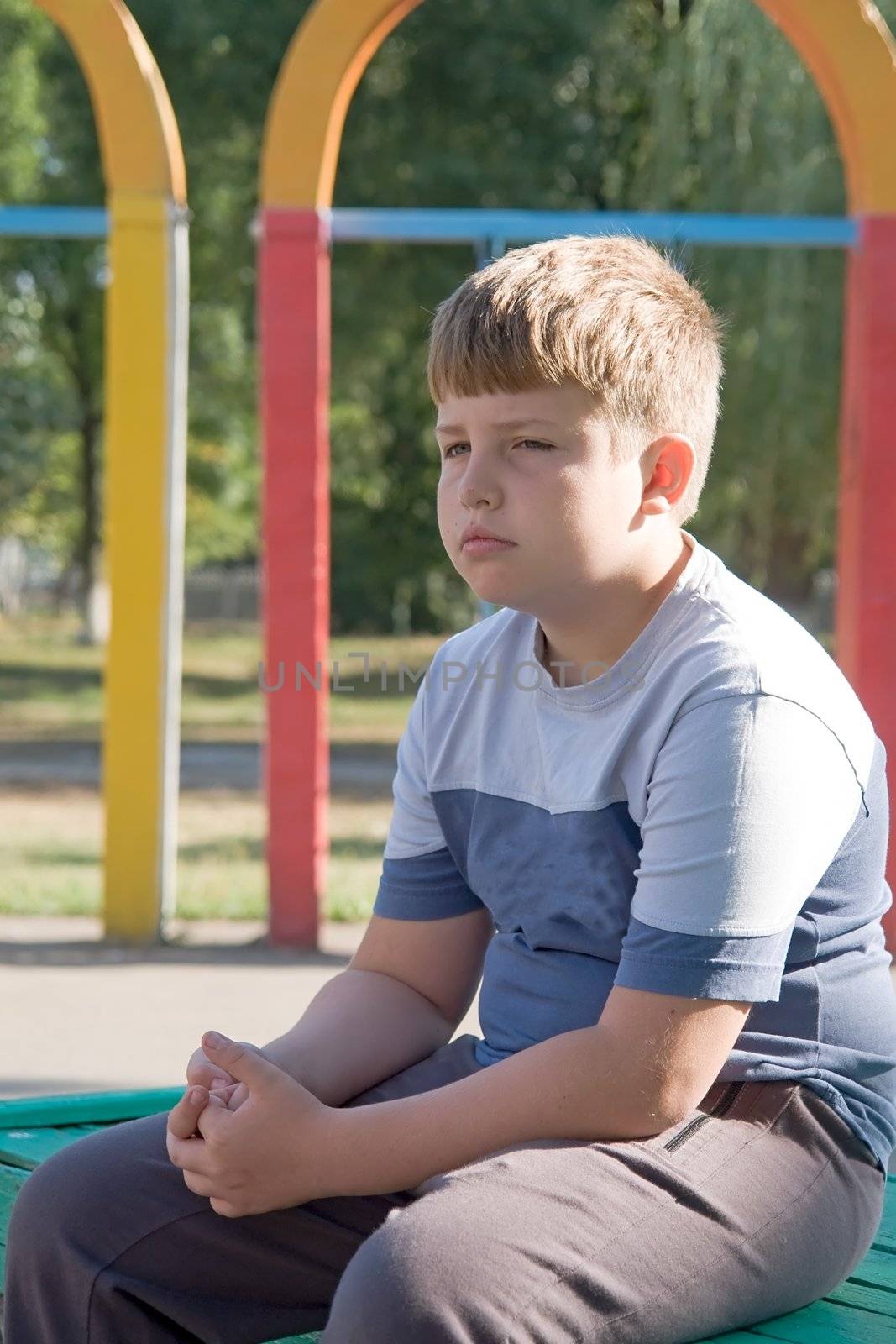 little boy. sad eyes. sad face