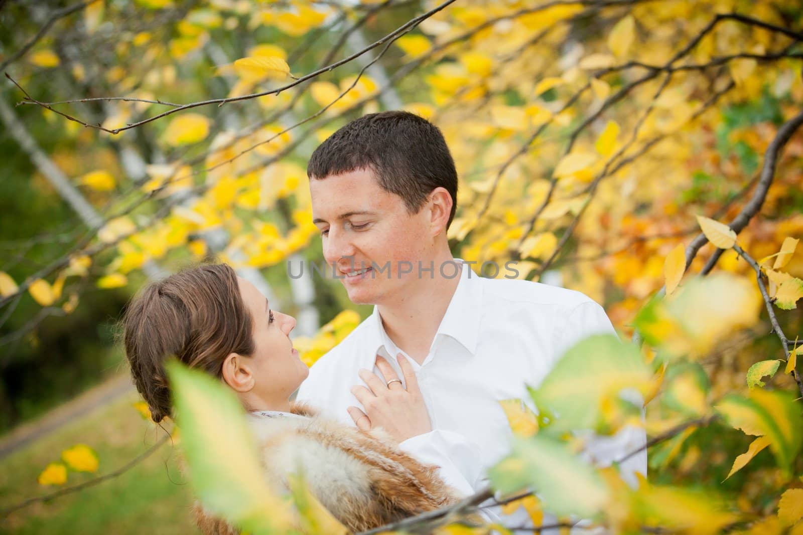 Portrait of romantic happy young beautiful couple on autumn walk